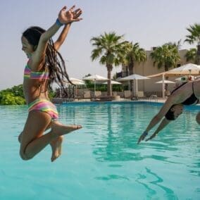 Cove Rotana Ras Al Khaimah family at the pool